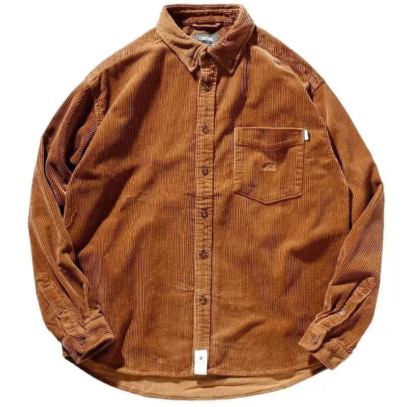 A loose-fitting caramel corduroy shirt with long sleeves in a casual cardigan style.