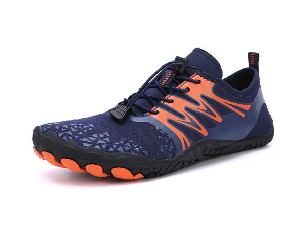 White and pink lace-up upstream sports shoes with a rubber sole on a neutral background.