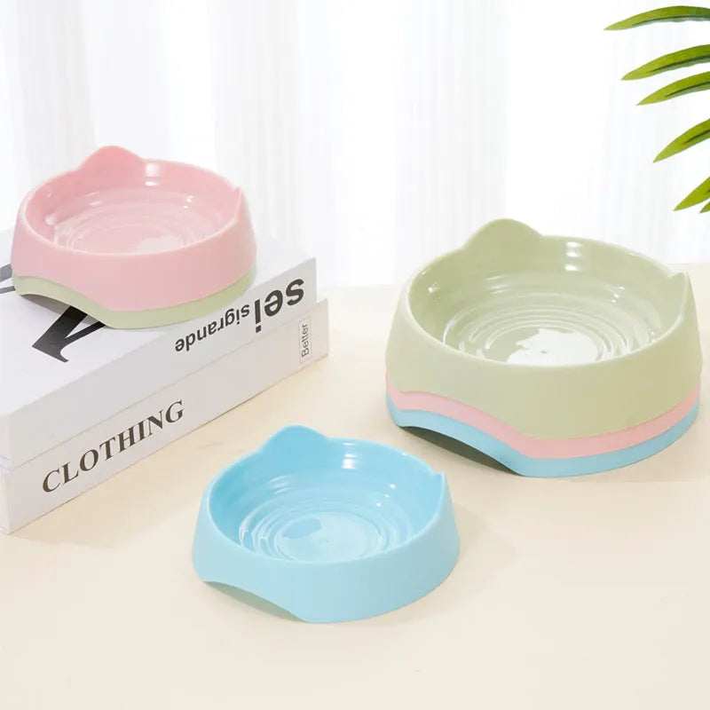 Blue ceramic dog slow feeder bowl with raised maze pattern for fast-eating dogs.