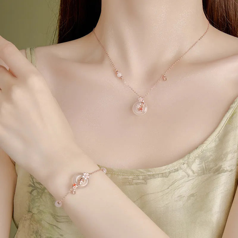 Sterling silver bracelet with white chalcedony crystals and electroplated koi pattern design