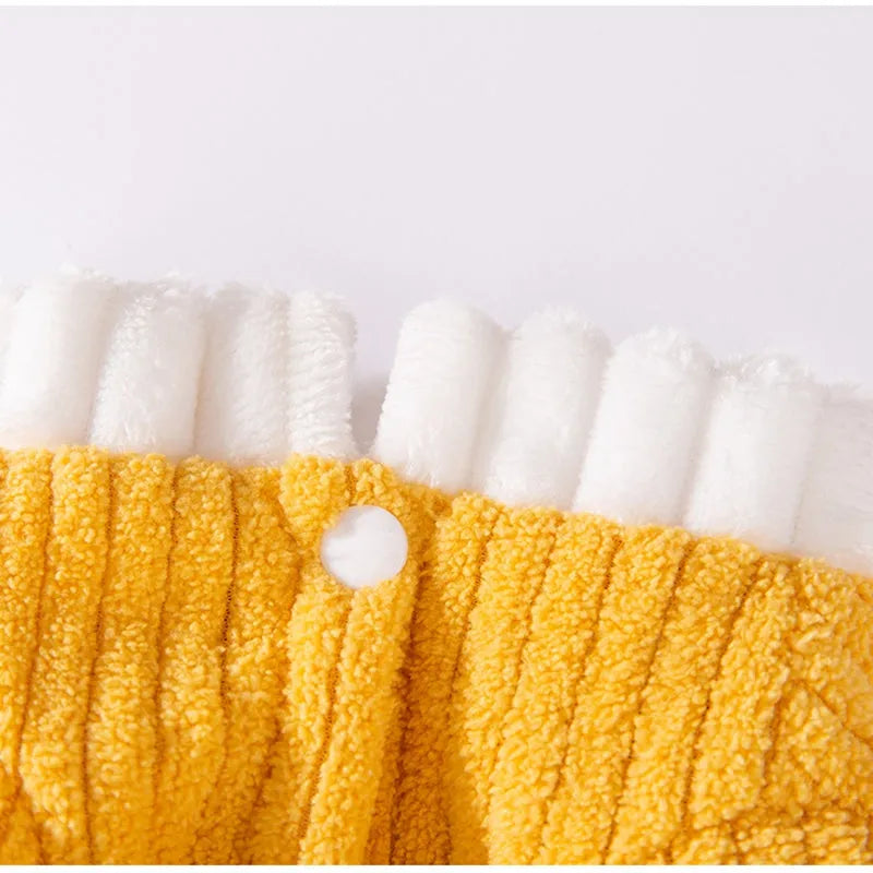 Yellow ribbed fleece pet jumpsuit with white ruffled cuffs and leash ring for cats and small dogs.