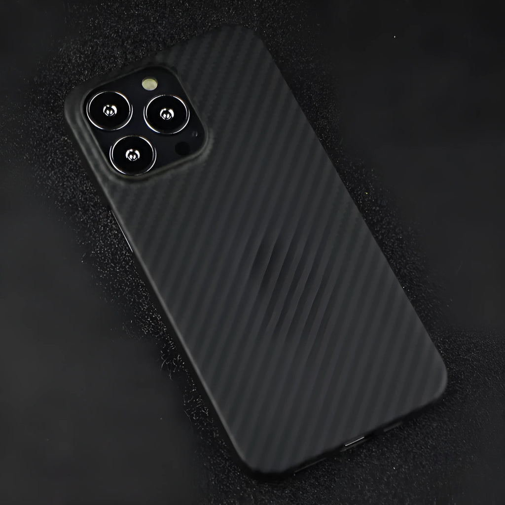 Kevlar fibre iPhone case with MagSafe magnetic charging compatibility in dull black Volcanic Crater pattern