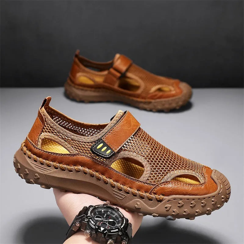 Men's black mesh sandal with Velcro strap on a rubber sole