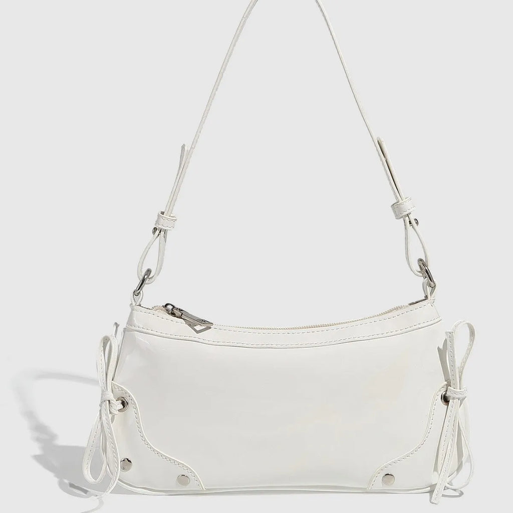 Solid colour PU underarm bag with double bow and rivet decoration, horizontal square shape
