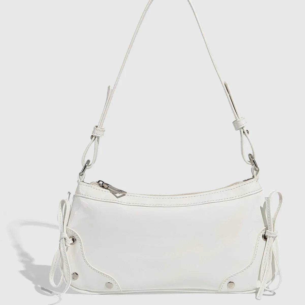 Solid colour PU underarm bag with double bow and rivet decoration, horizontal square shape