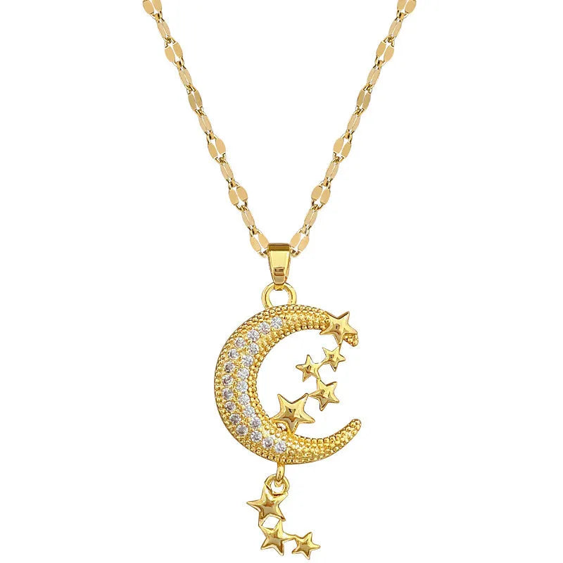 Geometric openwork moon pendant necklace with a linear crystal tassel on a silver stainless steel chain.