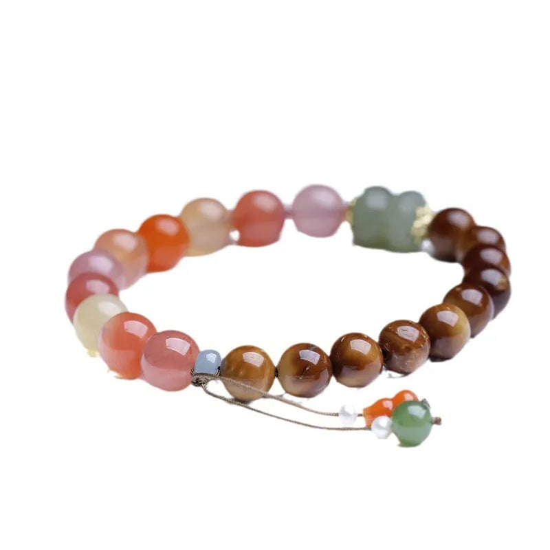 Women's 8mm diamond-shaped agate and Hetian jade bracelet with persimmon details.