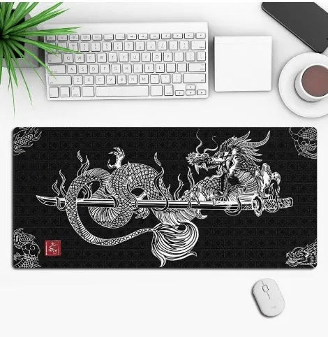 Large black anime-themed gaming mouse pad with non-slip rubber base on a wooden desk.