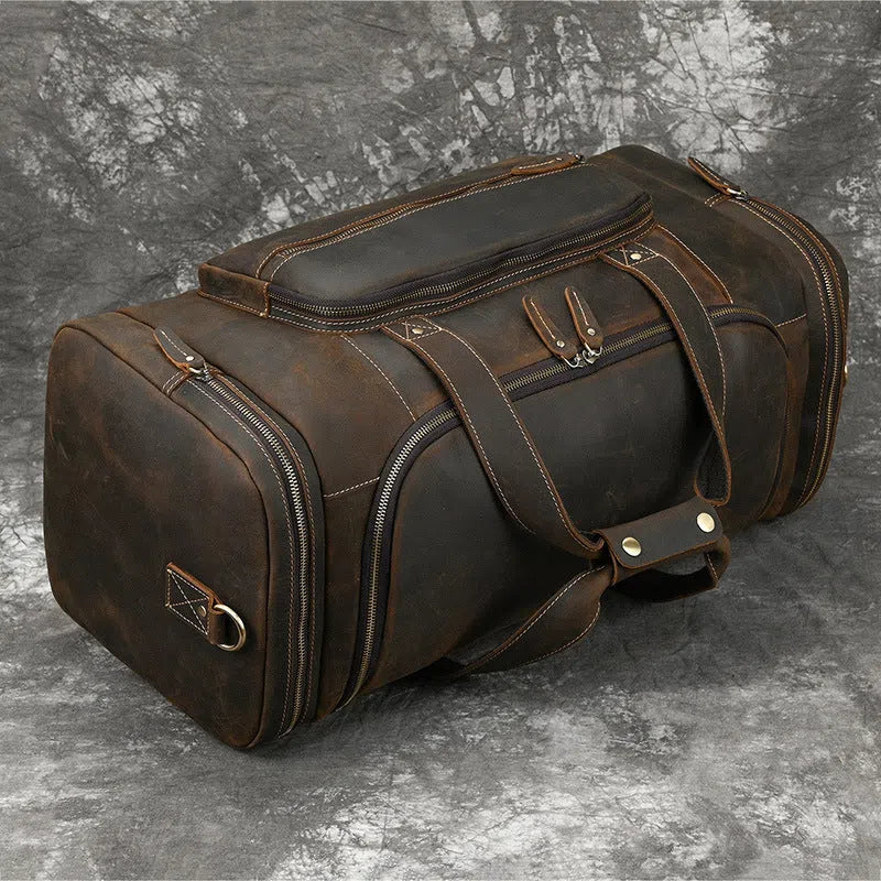 Men's full-grain cowhide leather crossbody bag in dark brown, with stitched seams and shoulder strap, 58cm size