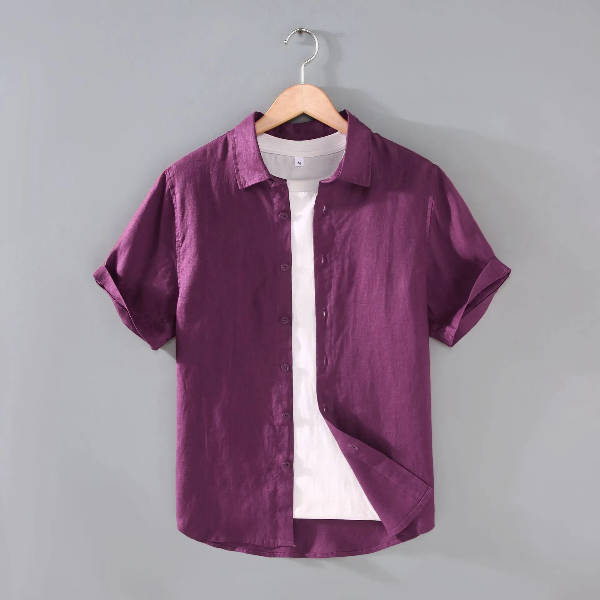 Men's casual short-sleeved linen shirt in regular cut available in seven colours including apricot, dark blue, and purple