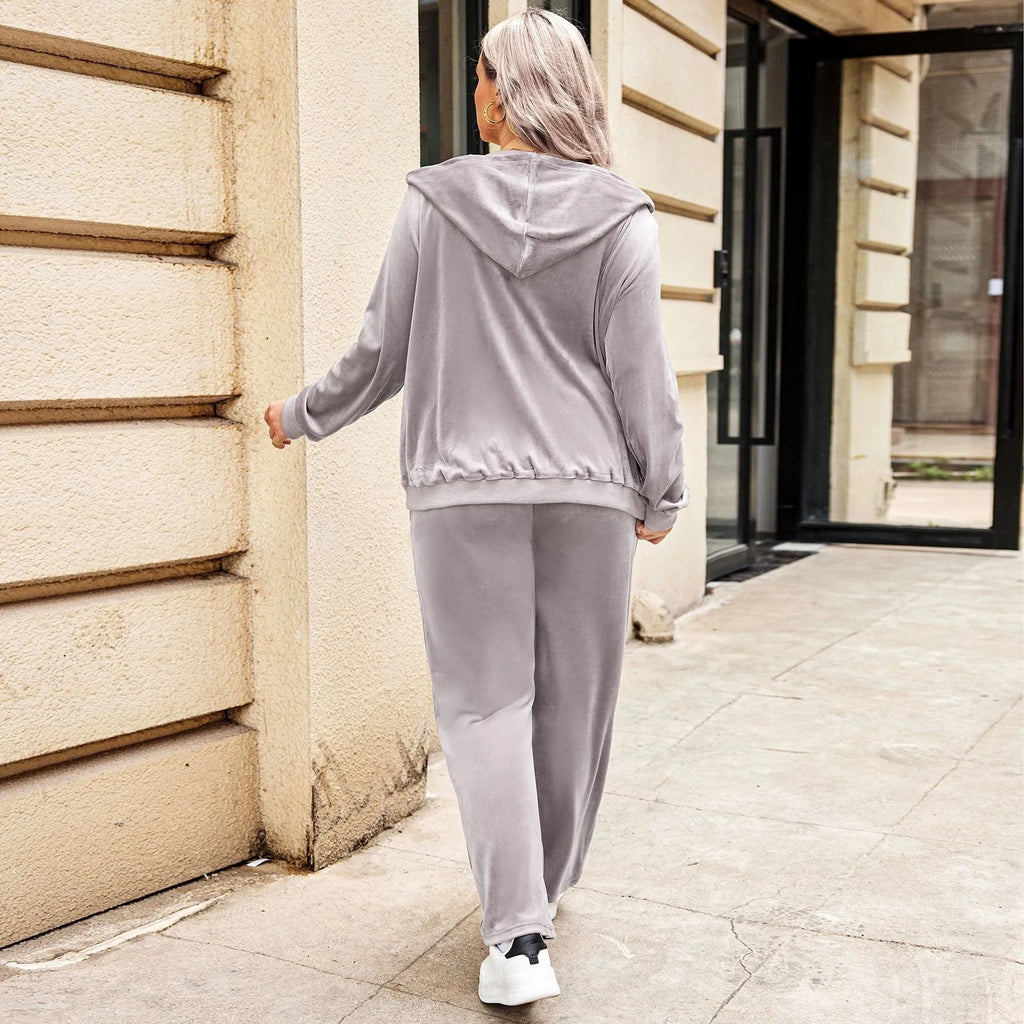 Plus size women's sports hooded tracksuit set in dark purple with long sleeves and full-length trousers, autumn winter style