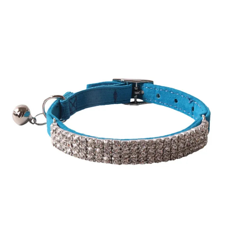 Soft flannel cat collar with elastic buckle in pink, black, red, blue, purple, and dark brown colours