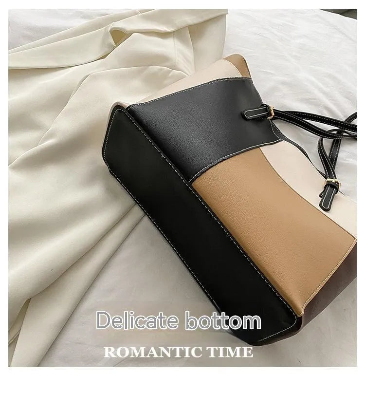 Large capacity women's PU tote bag with contrast stitching, available in khaki, green, blue, pink, and gray, featuring a phone pocket.