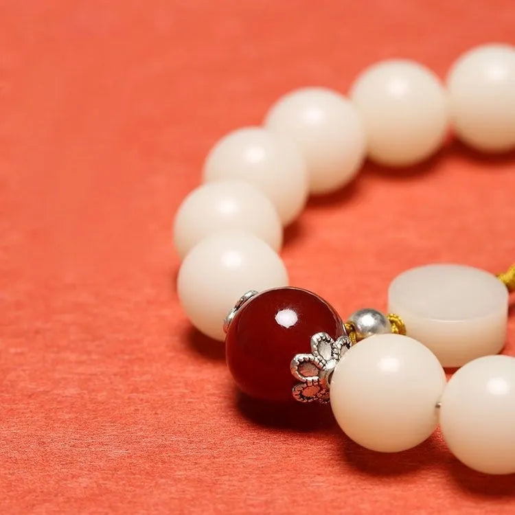 White jade bodhi couple's bracelet with 10mm beads and traditional Ruyi charm