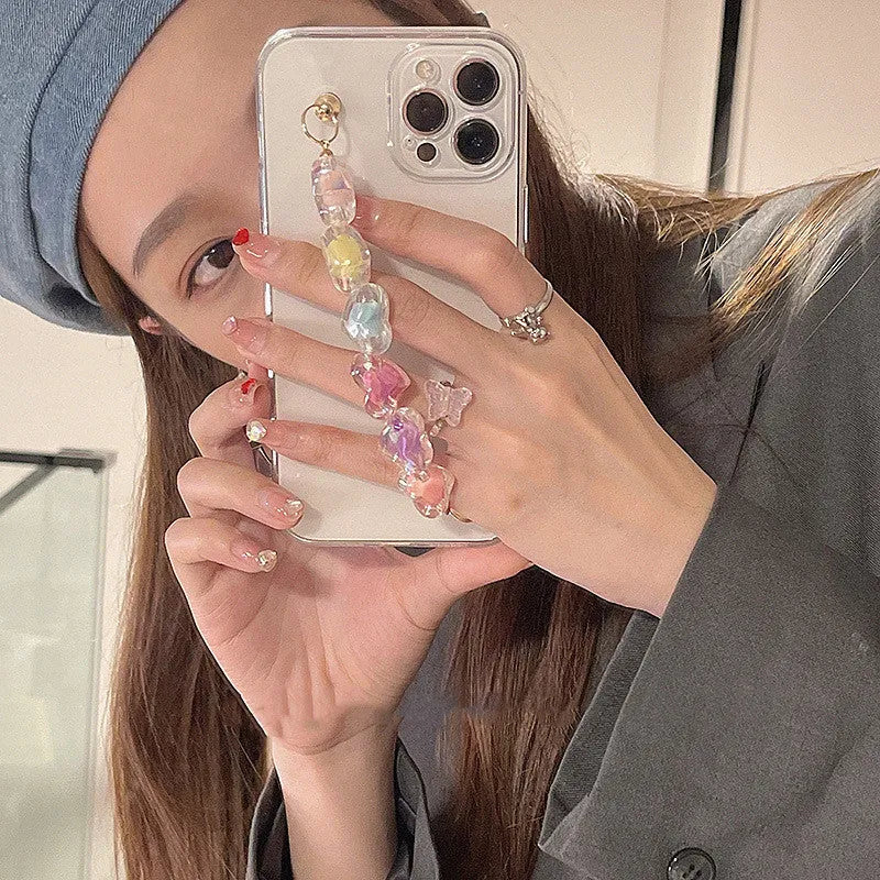 Transparent TPU iPhone case with handmade beaded candy chain and girly heart laser colour design on the back