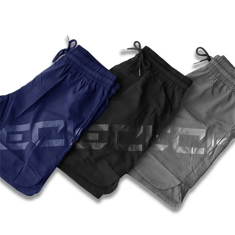 Men's elastic thin training running shorts in knee-length style with quick-drying nylon blend fabric