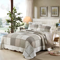 Washed pure cotton quilted bedspread and pillowcase three-piece set in a Korean style.