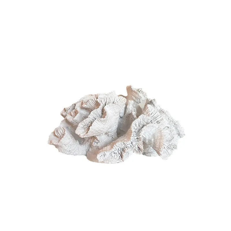 Off-white geometry coral ornament made from synthetic resin on a shelf