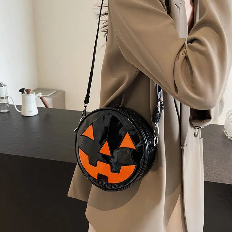 Small round pumpkin crossbody bag in PU, 18 x 18 x 7cm, shown in orange, black, and white