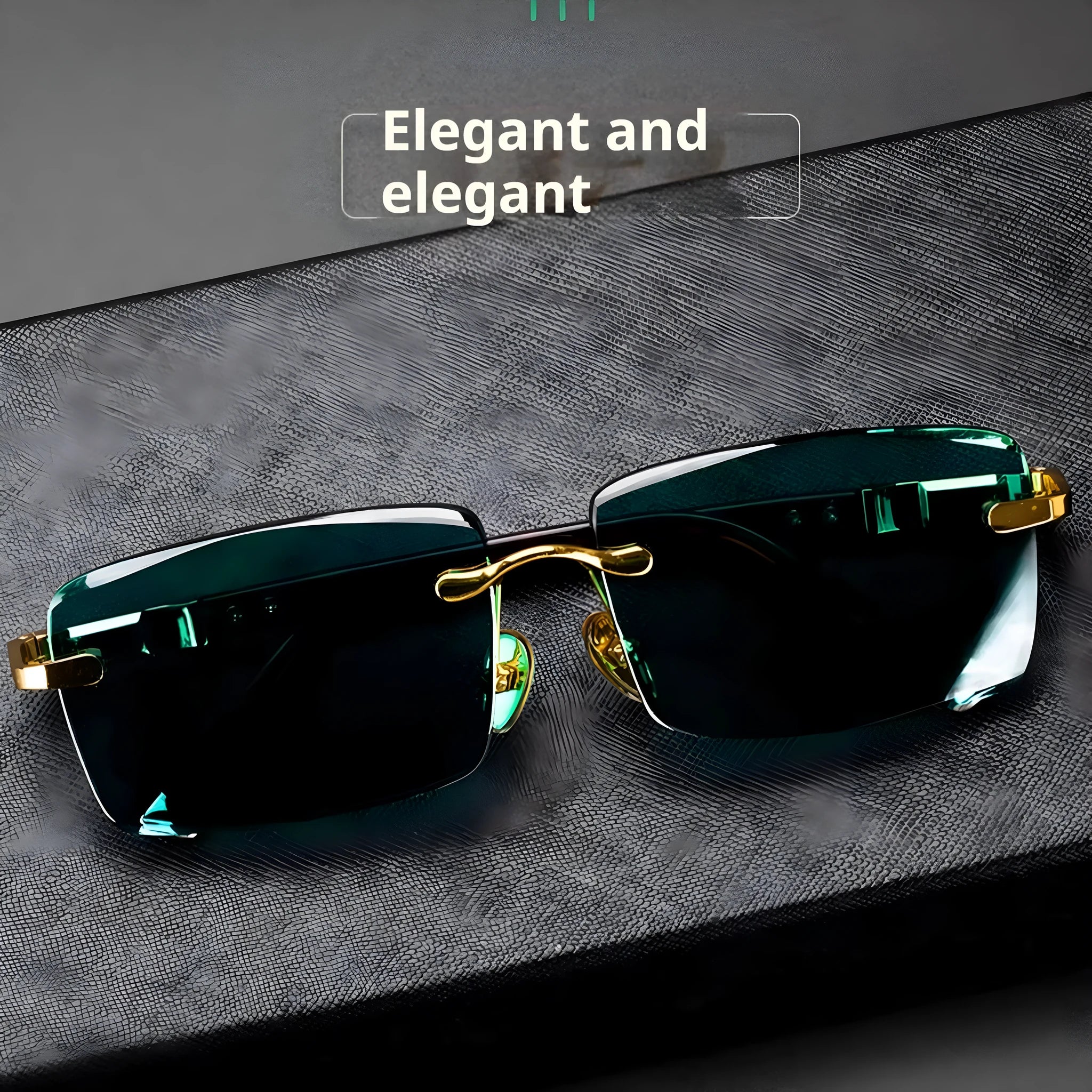 Frameless sunglasses with dark green tinted lenses and a black hard-shell case on a table.