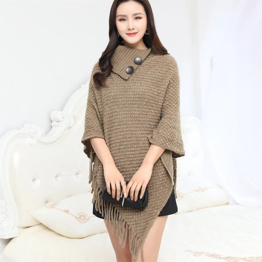 Women's sleeveless knit shawl cloak with dotted pattern in acrylic fibre shown in various colours