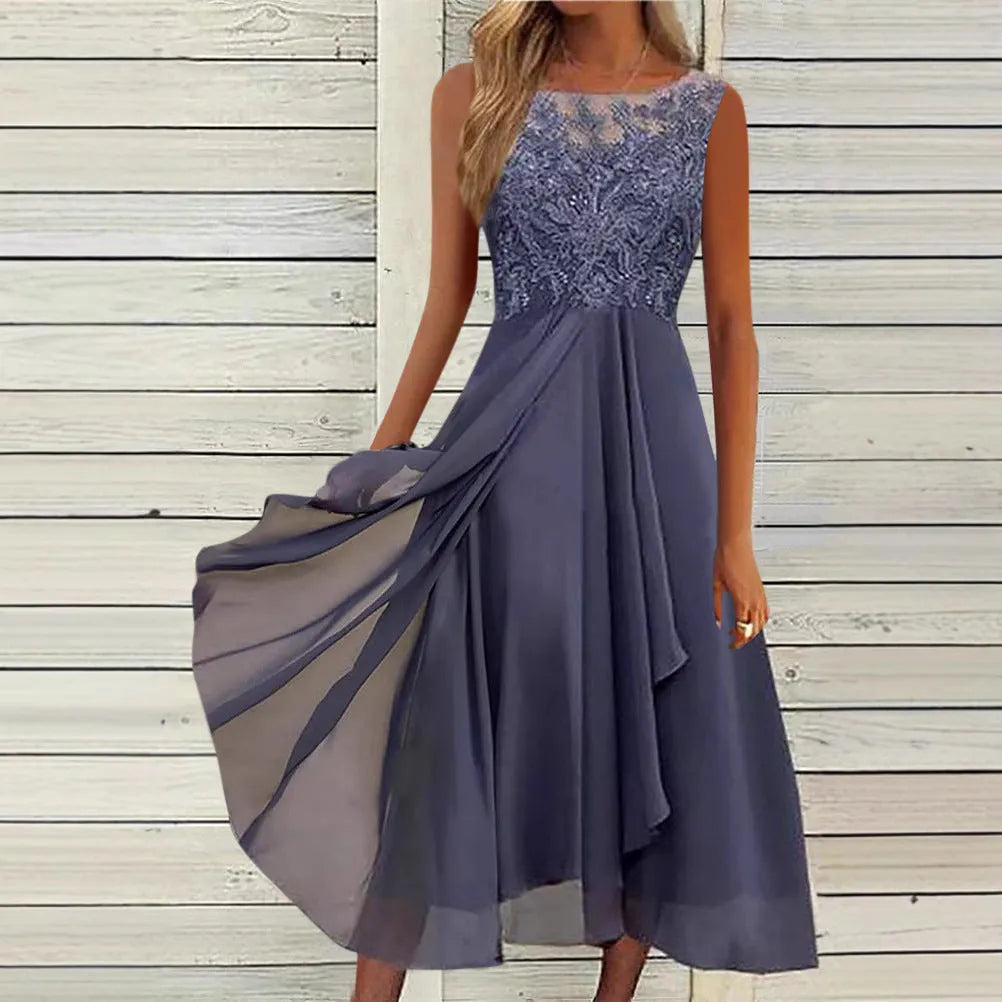 Women's sleeveless green chiffon dress with white lace hollow-out detail, mid-length skirt.