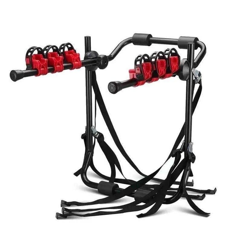 Black and red iron frame bike rack with straps for car boot mounting.