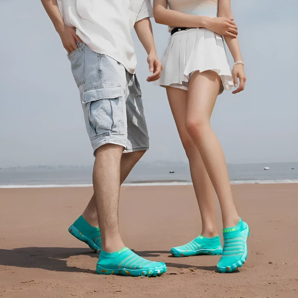 Men's and women's flyknit water shoes in camouflage colours with rubber sole and lace-up front.
