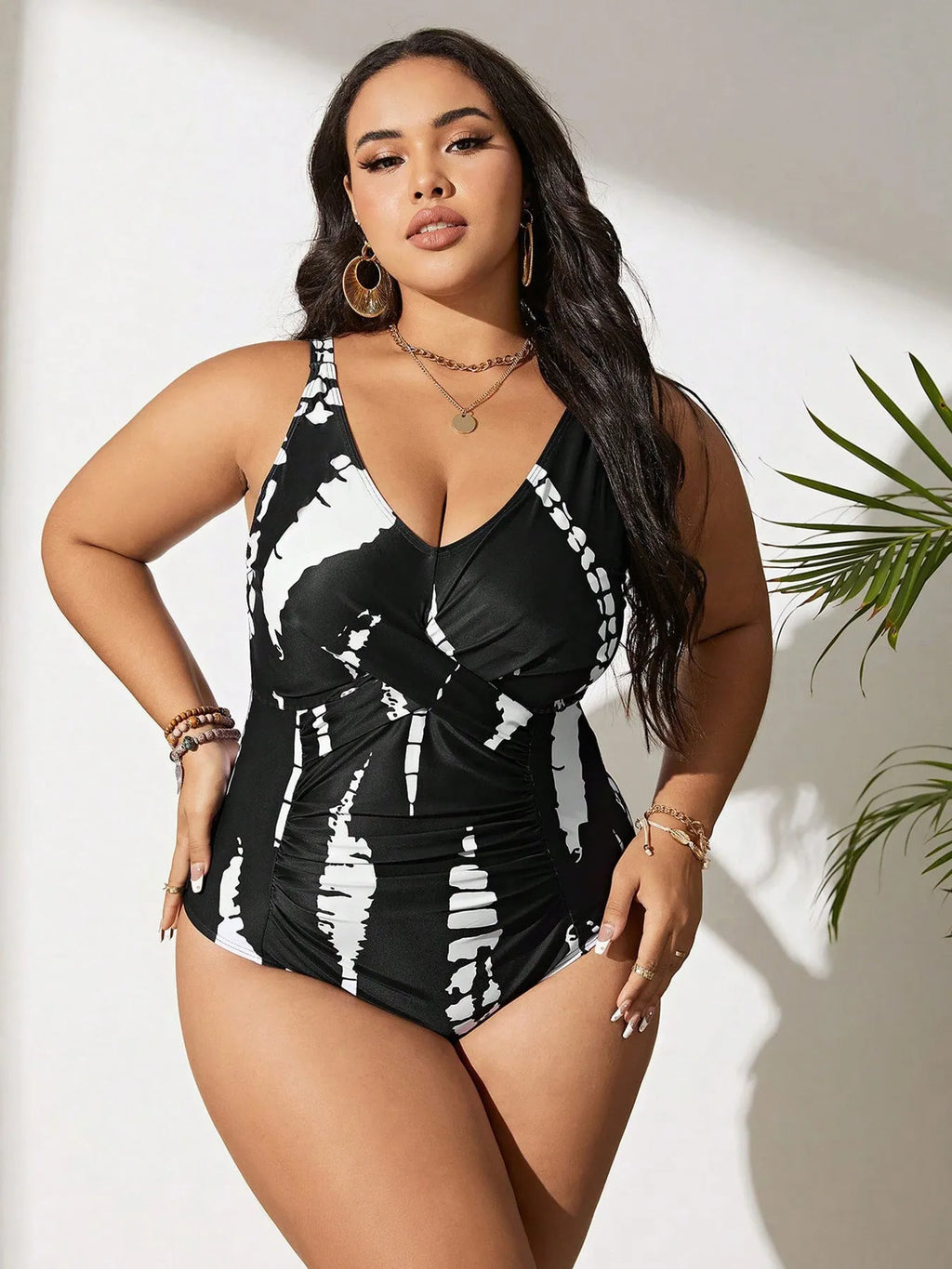 Black Siamese colour matching fit one-piece swimsuit for women on a size chart.