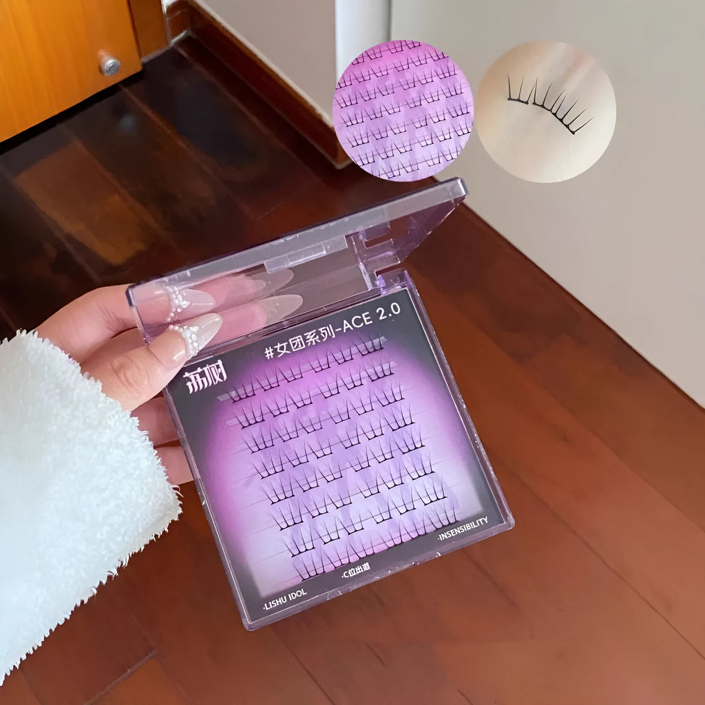 Pack of reusable artificial fibre false eyelash clusters on a white background.
