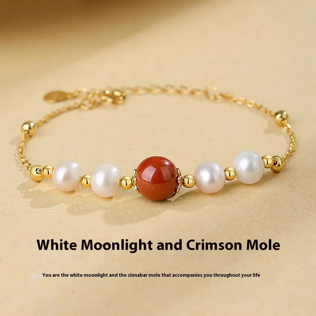 Yellow-finished 925 silver bracelet with red bean and pearl beads in retro style for women