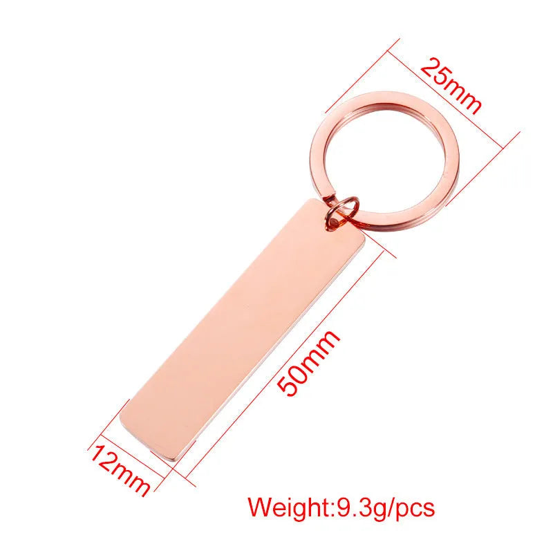 Stainless steel keychain with laser-engraved Spotify code in rose gold finish, rectangular pendant