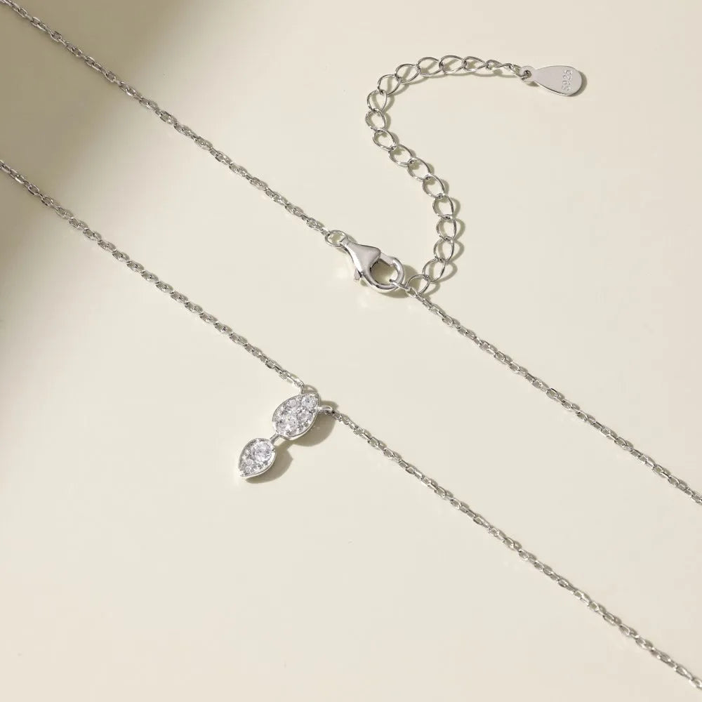 925 silver water drop necklace with round zircon and O-ring chain on display