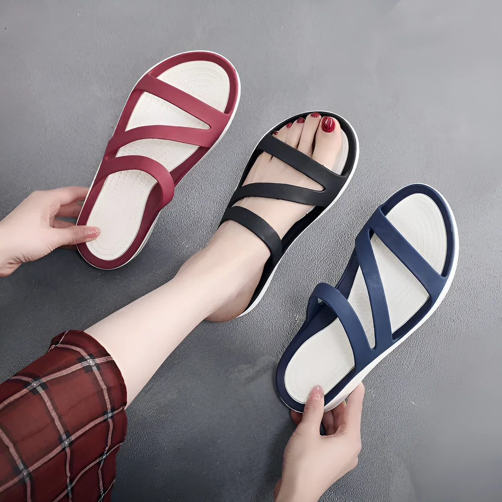 Women's solid colour casual sandals with a PP upper, shown in red, purple, blue, black, grey, or pink.