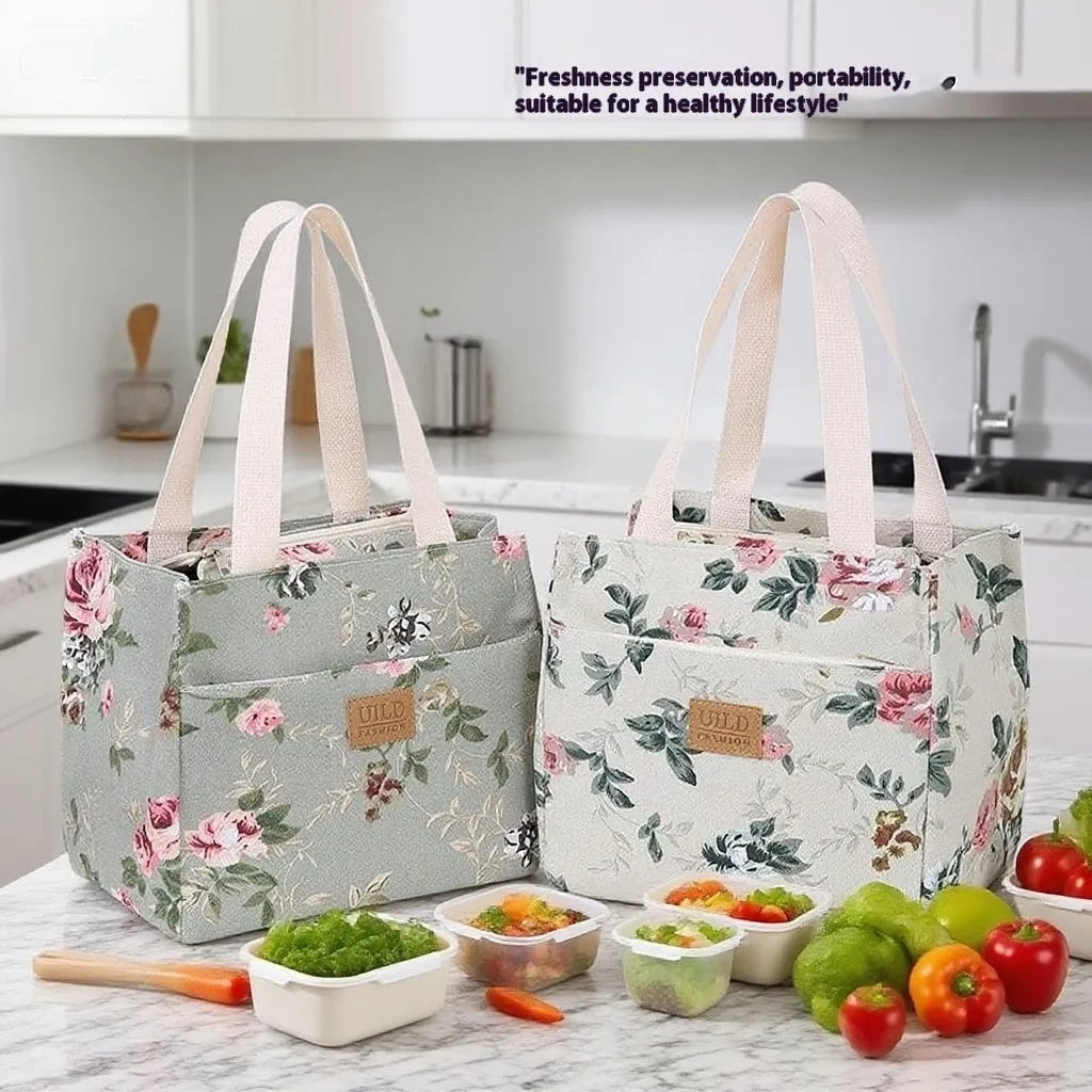 Women's large printed canvas tote bag with aluminium hardware in a horizontal square shape.
