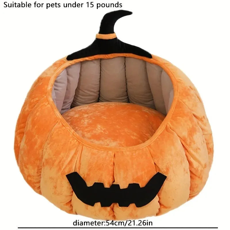 Halloween-themed orange pumpkin-shaped soft plush bed for a cat or small dog, featuring a cartoon devil design.