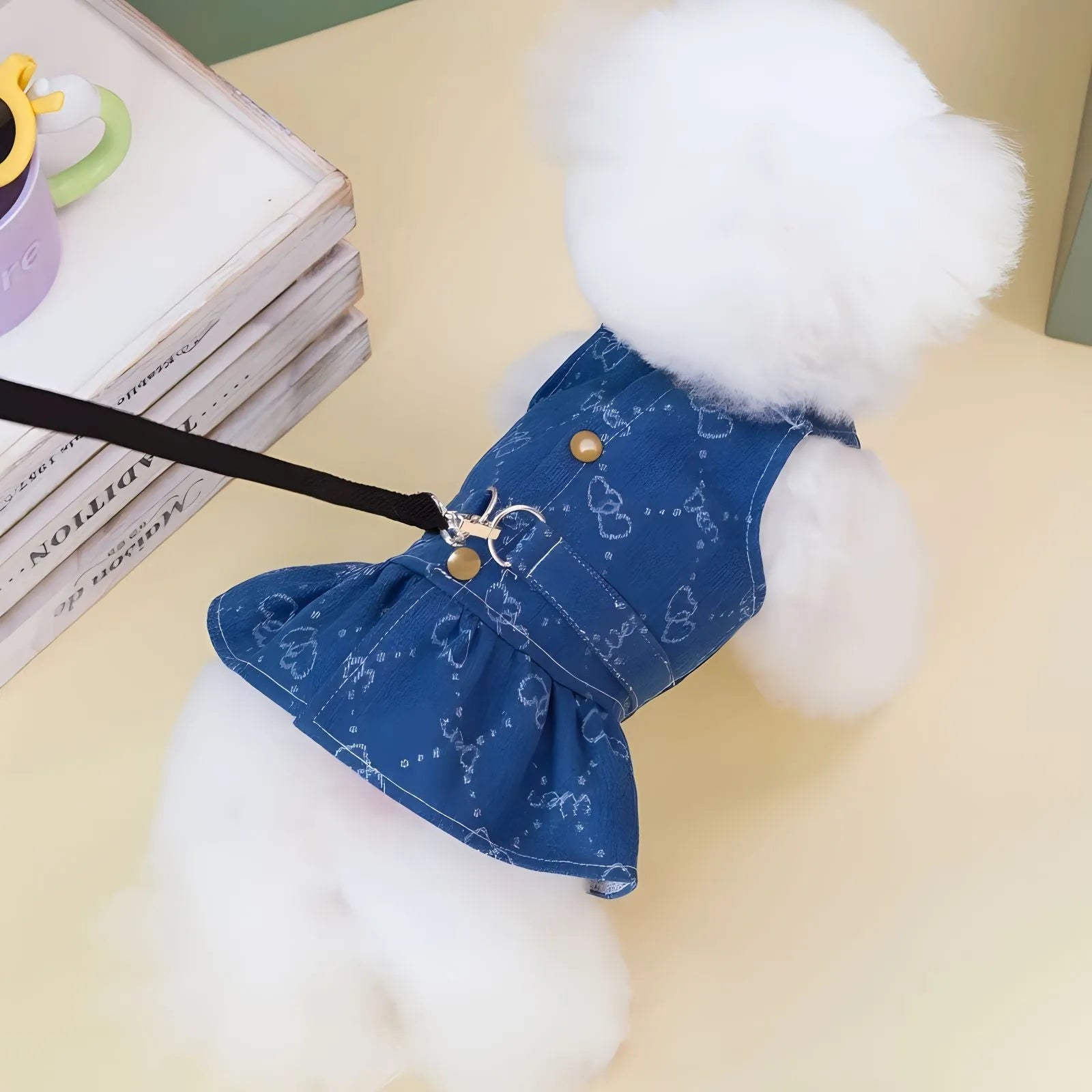 Blue denim princess dress for a small white dog, shown in brace-skirt and brace-T style variations.