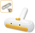 White portable pet hair remover brush with yellow duck cartoon design and polyester bristles.