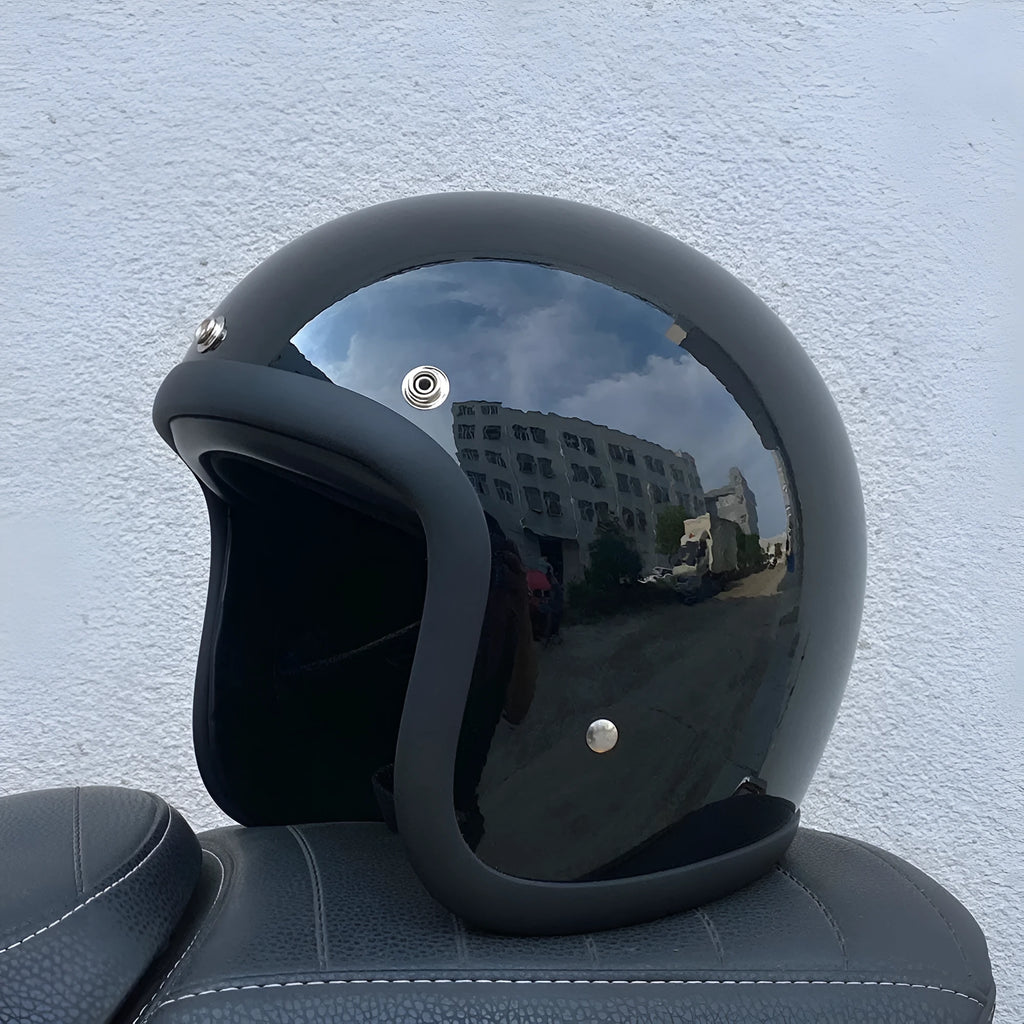 Cement Grey retro open-face motorcycle helmet with a smooth glass fibre shell on a plain background.