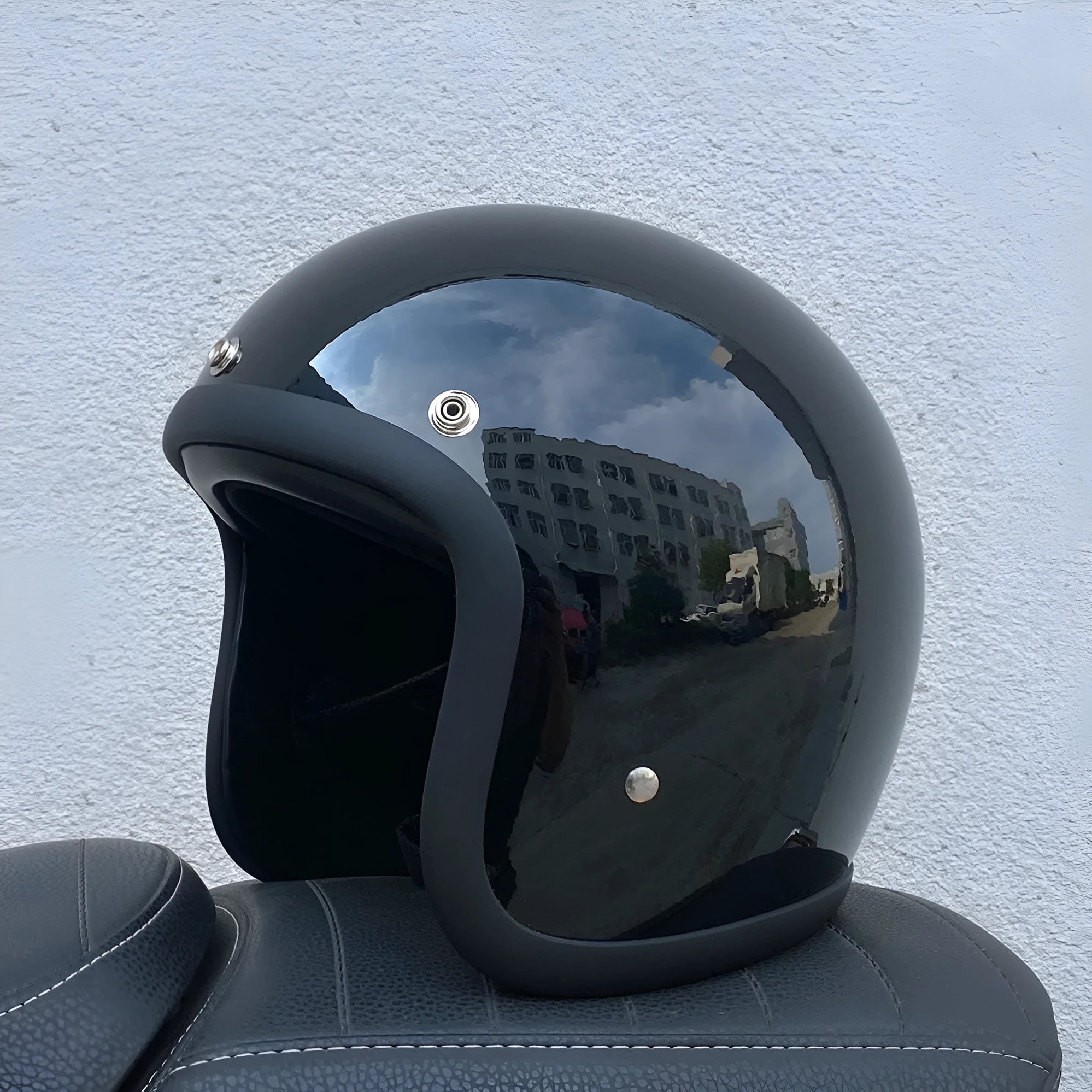 Cement Grey retro open-face motorcycle helmet with a smooth glass fibre shell on a plain background.