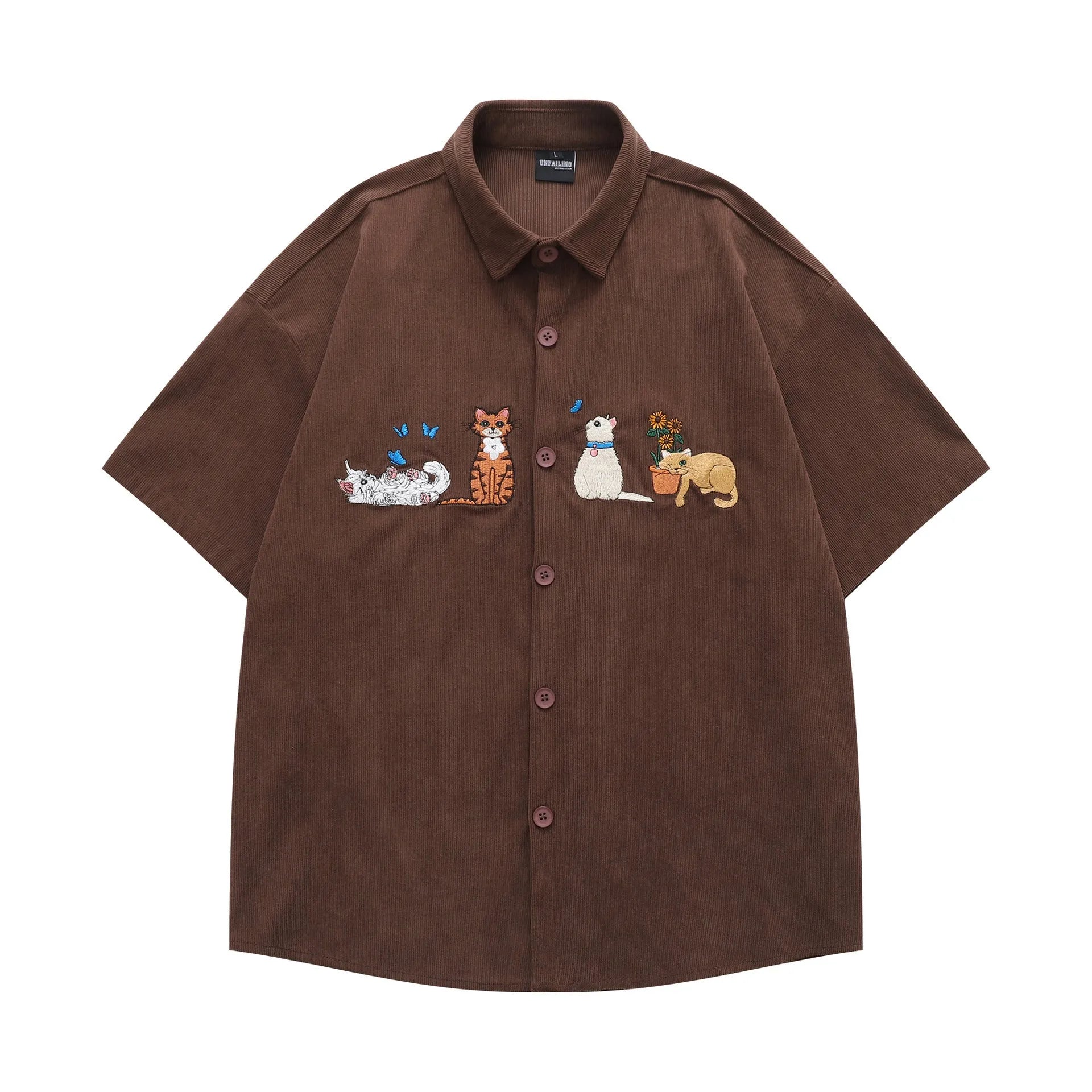 Loose apricot cardigan shirt with cartoon embroidery detail on the front