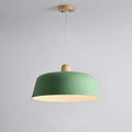 Round zinc alloy Nordic pendant hanging lamp in black finish with 38cm diameter over a dining table