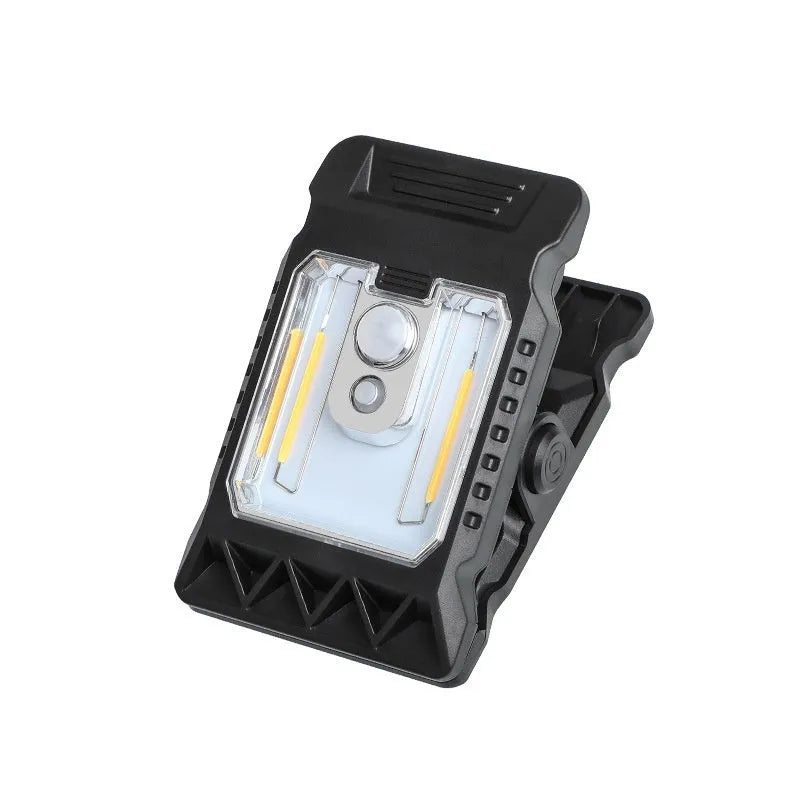 White motion sensor clip lamp for inside cupboards with LED light.