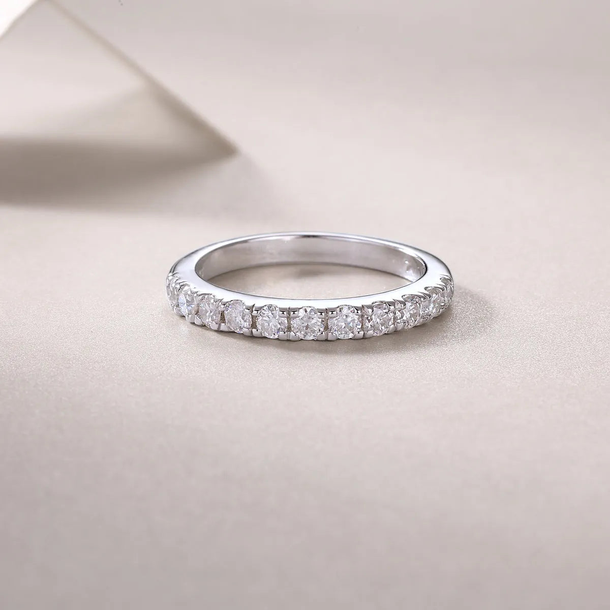 Parallel World moissanite wedding ring set in gold, S925 silver with platinum plating, on white background