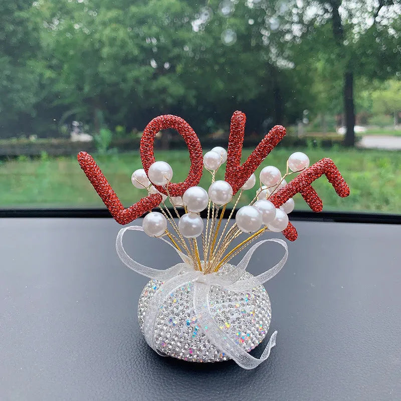 Clay diamond star decoration ornament for a car centre console in a modern colour design.