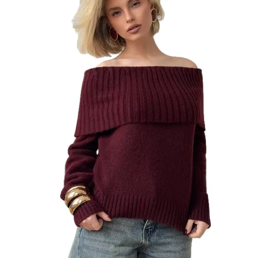 Grey off-the-shoulder sweater with a 3D pattern texture on the fabric.