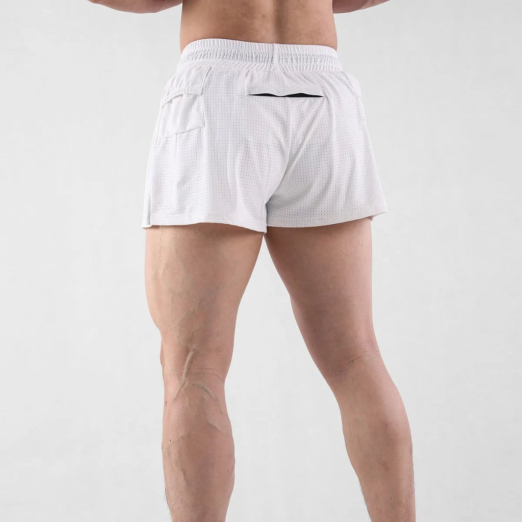 A pair of men's black nylon quick-dry shorts laid flat.