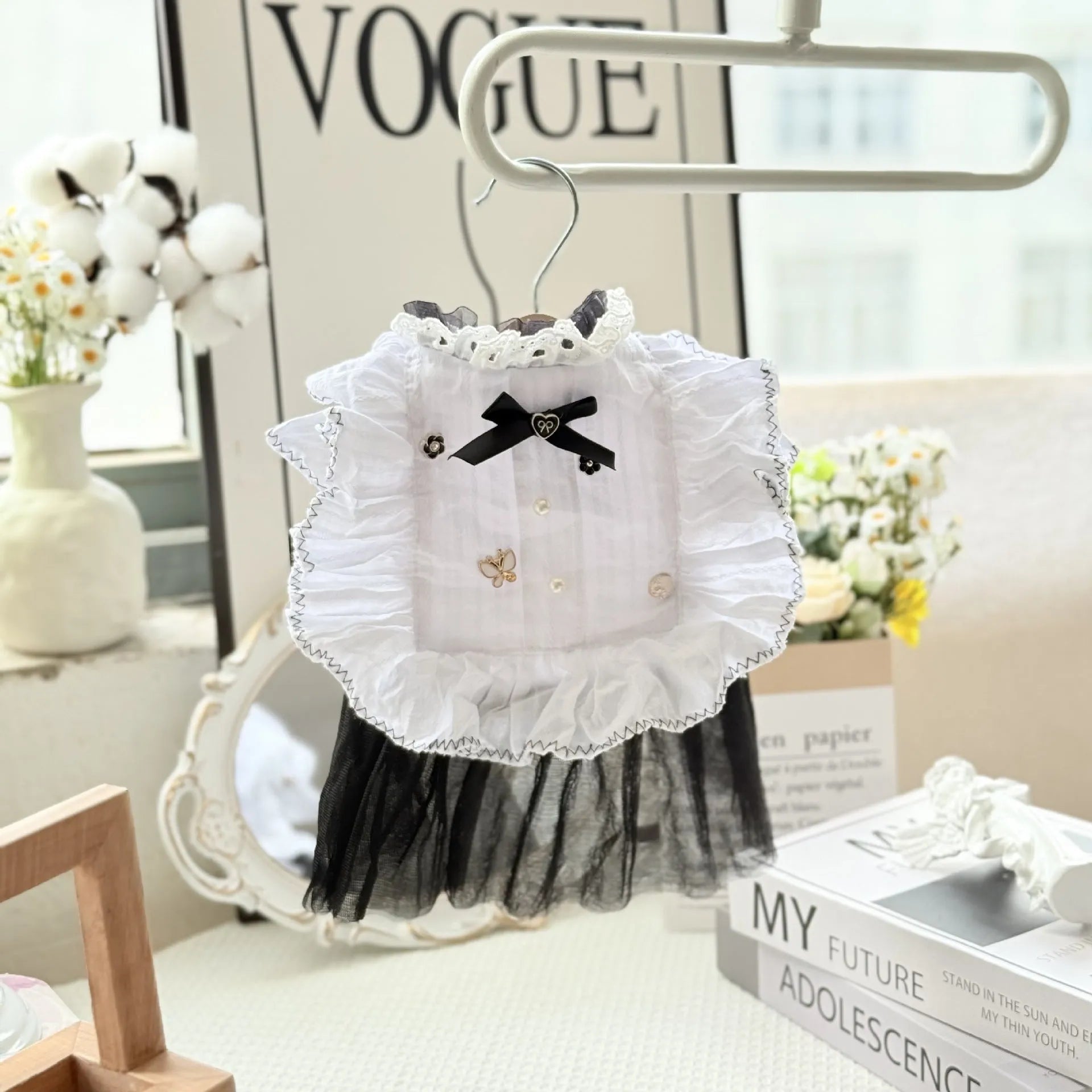 White princess-style dog dress with a gauze yarn skirt on a small dog, showing fit and style.