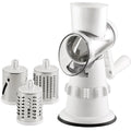 White 3-in-1 manual vegetable slicer with stainless steel blades on kitchen counter