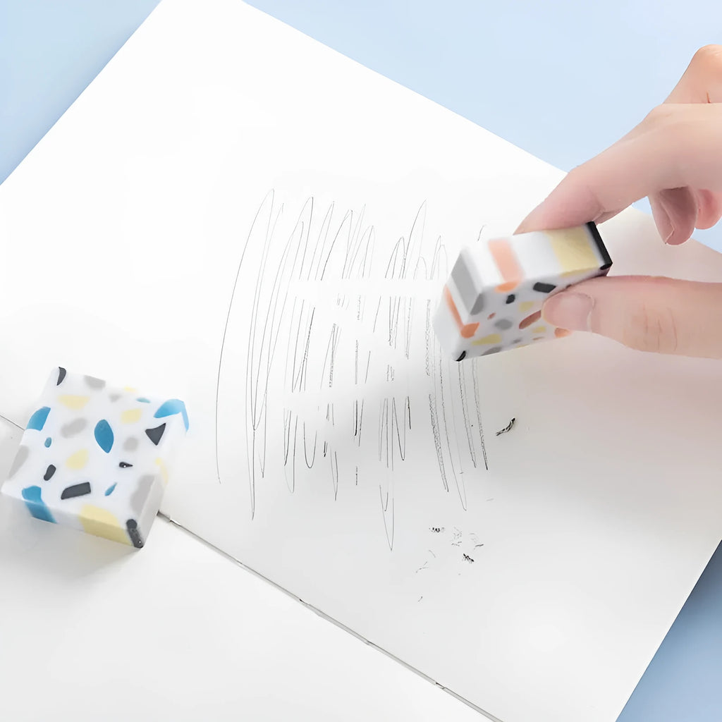 Small white PVC eraser measuring 36mm square with 12mm thickness for portable art drawing use
